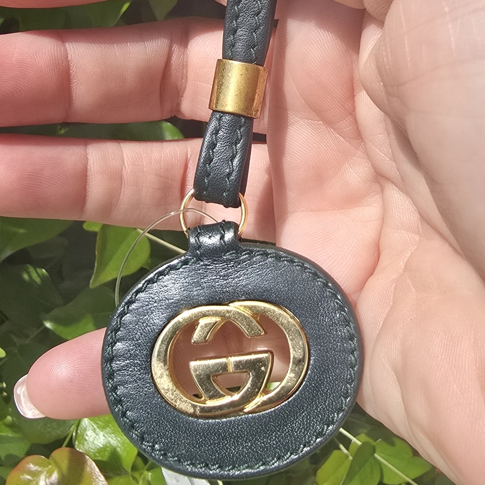 Gucci Bag Charm/Keychain DARK GREEN LEATHER . NEVER USED BUT ITS VINTAGE stamped
